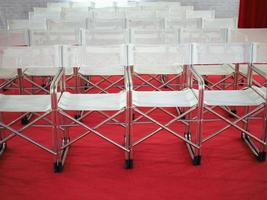 many folding chairs photo