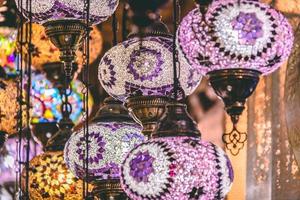 Moroccan or Turkish mosaic lamps and lanterns background selective focus photo