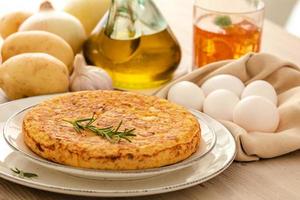 Spanish omelette with potatoes and onion, typical Spanish cuisine. photo