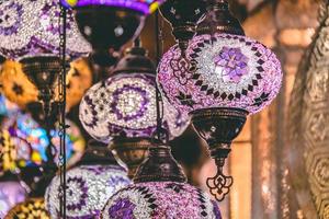 Moroccan or Turkish mosaic lamps and lanterns background selective focus photo