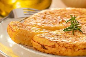Spanish omelette with potatoes and onion, typical Spanish cuisine. Tortilla espanola photo