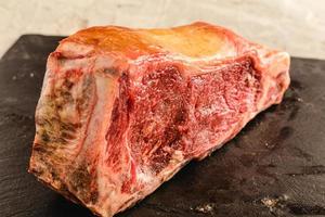 Ready-to-cook raw aged beef. Chuleton rubia gallega photo