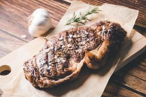 Barbecue Aged Roast Beef on wood background
