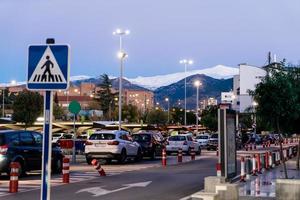 GRANADA, SPAIN,  NOVEMBER 2, A sunset in the street with Sierra Nevada views with snow photo