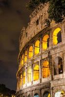 Colosseum of Rome at night photo