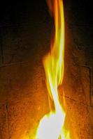 Romantic bright open fire on wood in a hut, Norway. photo