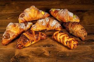 sweet croissants with mixed creams photo