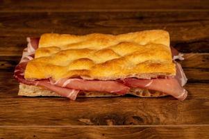 stuffed focaccia with cold cuts and vegetables photo