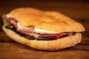 stuffed focaccia with cold cuts and vegetables photo