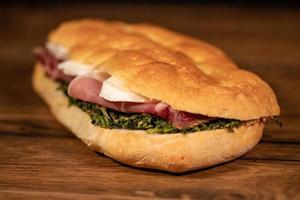 stuffed focaccia with cold cuts and vegetables photo