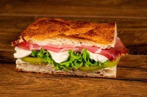 stuffed focaccia with cold cuts and vegetables photo