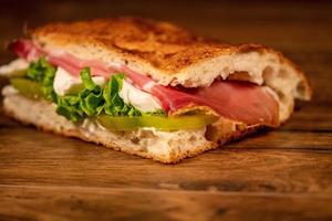 stuffed focaccia with cold cuts and vegetables photo