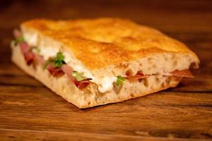 stuffed focaccia with cold cuts and vegetables photo