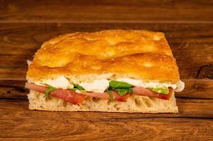 stuffed focaccia with cold cuts and vegetables photo