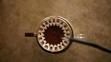 The barista makes hot drip coffee and is ready to serve in the morning. video