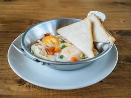 Breakfast set of fried egg and breads. photo