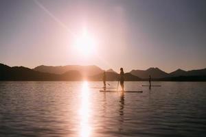 Stand up paddle at sunset photo