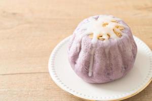 taro bun with white sugar cream and nut photo