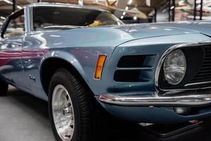 SINSHEIM, GERMANY - OCTOBER 16, 2018 Technik Museum. Take a close look. Front view of rare blue automobile at car show photo