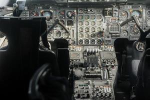 SINSHEIM, GERMANY - OCTOBER 16, 2018 Technik Museum. Take a look closer to these devices. Old analog cockpit of the plane. Inside near pilot seats photo