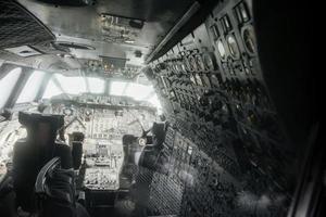 SINSHEIM, GERMANY - OCTOBER 16, 2018 Technik Museum. Inside of the aged plane with two pilot seats and instruments photo