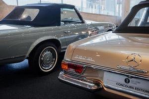 STUTTGART, GERMANY - OCTOBER 16, 2018 Mercedes Museum. Read and side parts. Nice looking old retro cars at the auto show photo