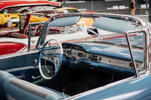 SINSHEIM, GERMANY - OCTOBER 16, 2018 Technik Museum. Taking close look to the blue retro car with vintage design photo