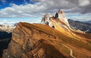 Gorgeous daylight. Outstanding hills of the Seceda dolomite mountains at daytime photo