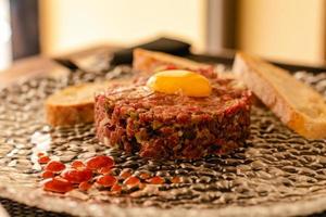 Steak tartar of old cow sirloin with 40 days of maturation on restaurant photo