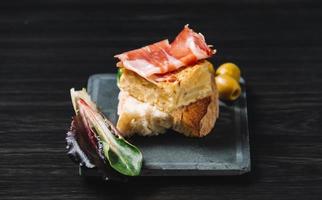 Delicious spanish tapas on a wooden table