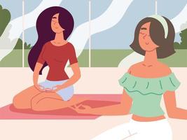 mujeres meditando en la clase de yoga vector