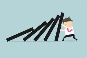 Businessman pushing hard against falling deck of domino tiles. vector