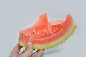 Fresh ripe watermelon cut into pieces photo