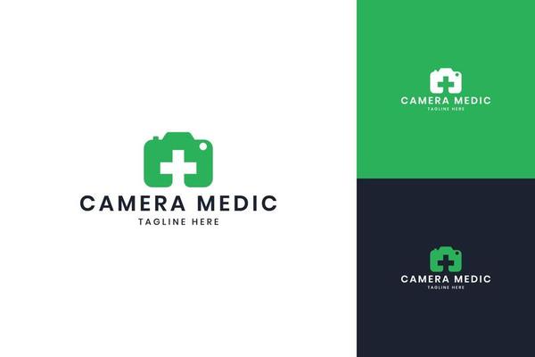 camera medical negative space logo design