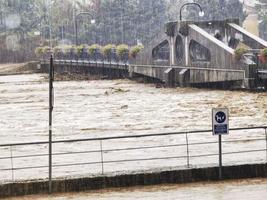 images of rivers in flood, floods and catastrophes linked to autumn rains photo