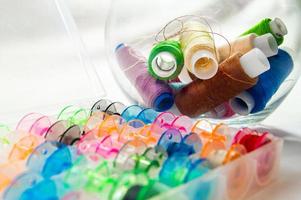 Bobbins with thread photo