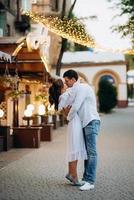 guy and a girl happily walk in the morning on the empty streets photo