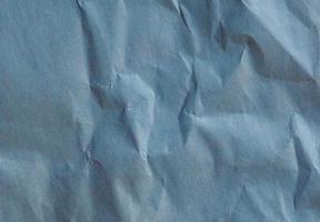 blue crinkled paper texture background photo