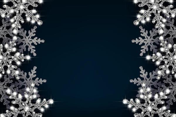 Christmas banner with a border of white, sparkling snowflakes with bright glitter.
