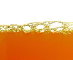 yellow bubbles in the orange juice