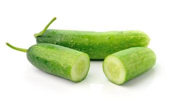 Fresh cucumber slice isolated on white background photo