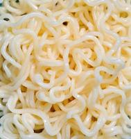 Egg noodles, isolated on background. photo