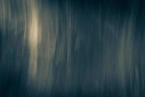 Abstract dark blue background with vertical highlights. photo