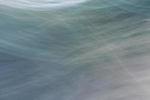 Gray-blue abstract background from wavy lines. photo