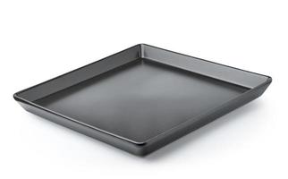 Black plate isolated on white background photo