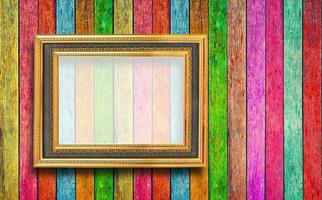 photo frame on Colorful wood texture
