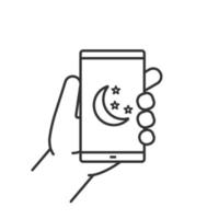 Hand holding smartphone linear icon. Thin line illustration. Smart phone night mode. Contour symbol. Vector isolated outline drawing