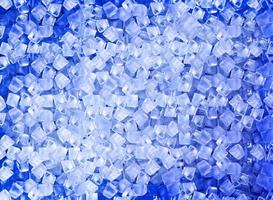 background with ice cubes in blue light photo