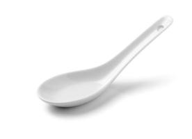 White Chinese soup spoon isolated on white background photo