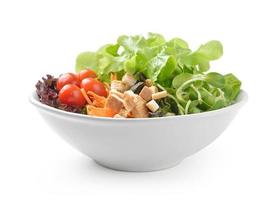 salad in plate isolated on white background photo